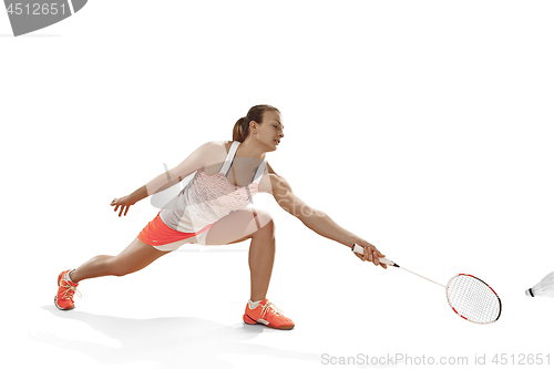 Image of Young woman playing badminton over white background