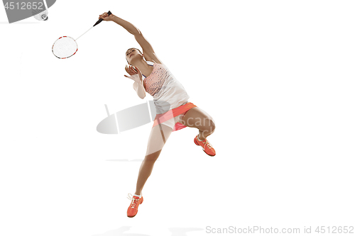 Image of Young woman playing badminton over white background