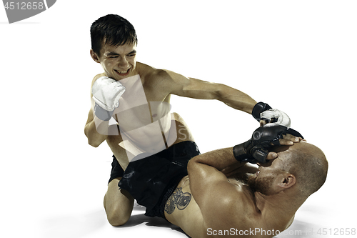 Image of Two professional boxer boxing isolated on white studio background