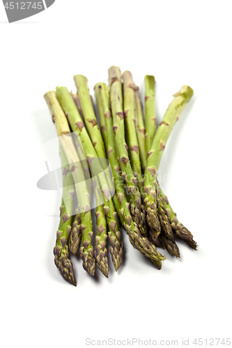 Image of Bunch of fresh raw garden asparagus isolated on white background