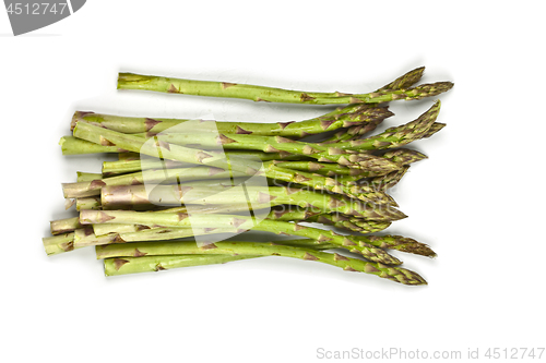 Image of Bunch of fresh raw garden asparagus isolated on white background