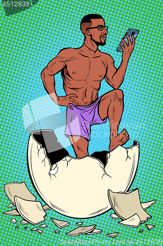 Image of newborn male in his underwear reads the gadget. eggshell