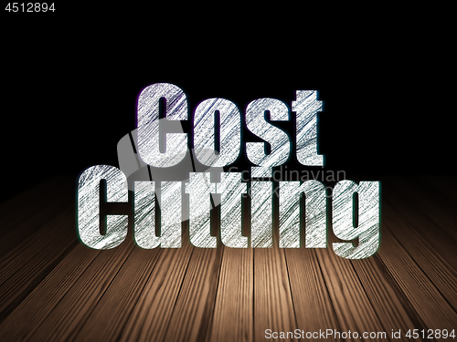 Image of Business concept: Cost Cutting in grunge dark room