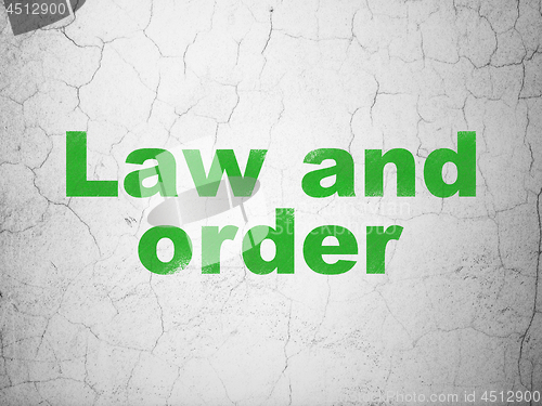 Image of Law concept: Law And Order on wall background