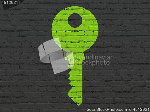 Image of Security concept: Key on wall background