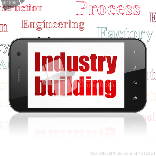 Image of Industry concept: Smartphone with Industry Building on display