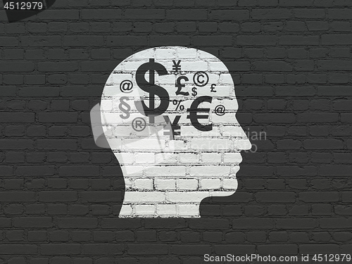 Image of Education concept: Head With Finance Symbol on wall background