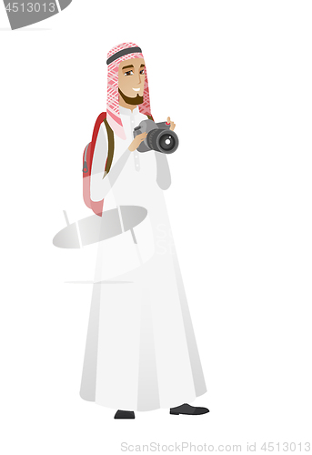 Image of Muslim nature photographer with digital camera.