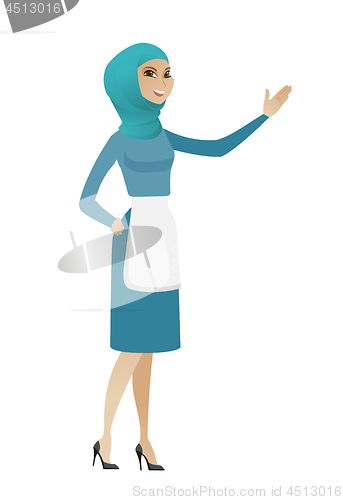 Image of Muslim cleaner pointing at something by hand.