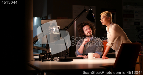 Image of young designers in the night office