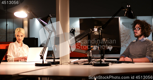 Image of young designers in the night office