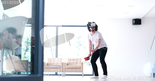 Image of man using VR-headset glasses of virtual reality