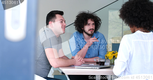 Image of Multiethnic startup business team on meeting
