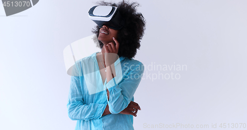 Image of black girl using VR headset glasses of virtual reality