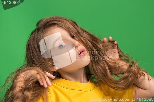 Image of Young serious thoughtful sad teen girl