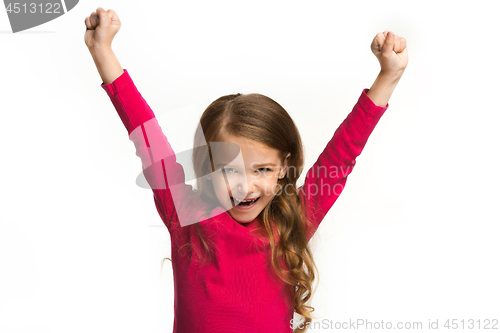 Image of Happy success teen girl celebrating being a winner. Dynamic energetic image of female model