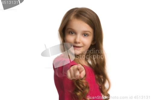 Image of The teen girl pointing to you, half length closeup portrait on white background.