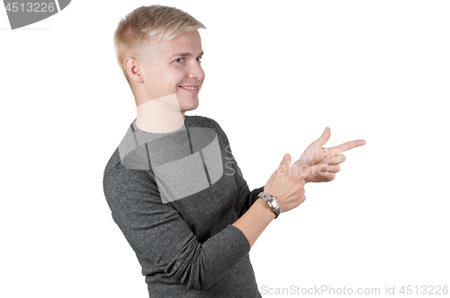 Image of Man in gray pointing with his fingers