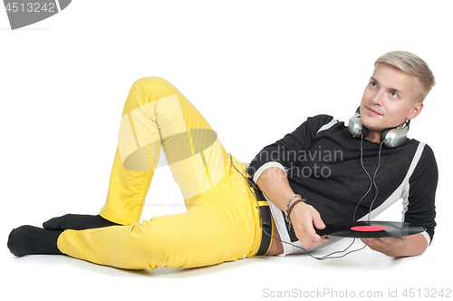 Image of Young man with vinyl record