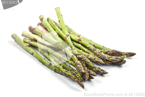 Image of Bunch of fresh raw garden asparagus isolated on white background