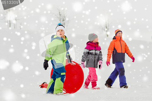 Image of happy little kids with outdoors in winter