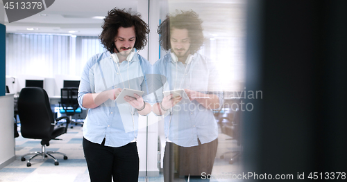 Image of businessman using tablet computer