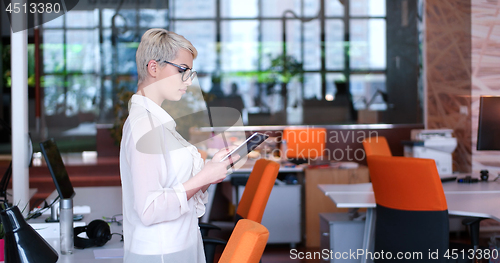 Image of Businesswoman using tablet