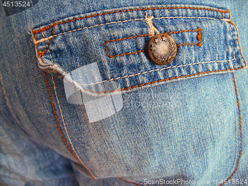 Image of Blue jeans with pockets close-up