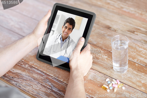 Image of patient having video chat with doctor on tablet pc