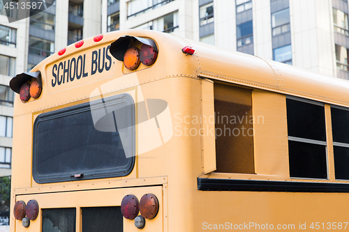 Image of close up of american schoolbus on city street