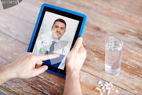 Image of patient having video chat with doctor on tablet pc