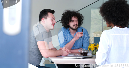 Image of Multiethnic startup business team on meeting