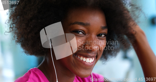 Image of portrait of young black woman in gym