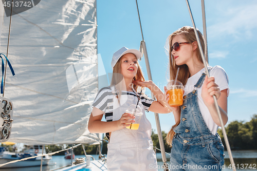 Image of The children on board of sea yacht