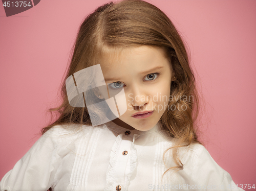 Image of Beautiful teen girl looking suprised isolated on pink