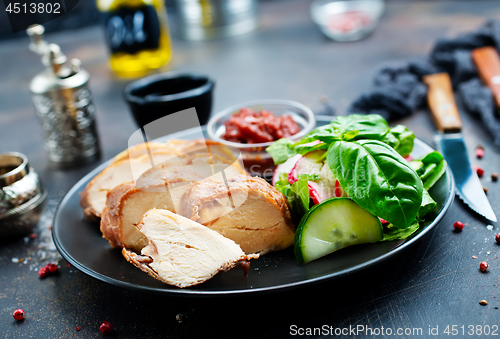 Image of meat with salad