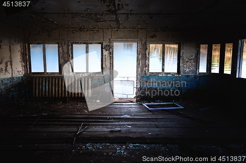 Image of Dark room of abandoned boat lakeside