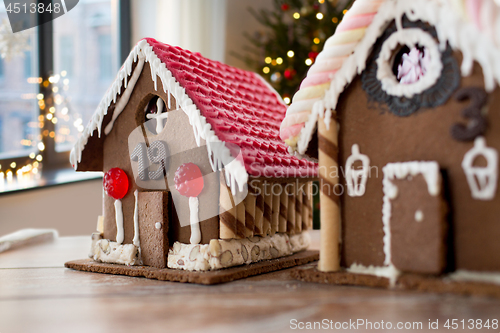 Image of close up of christmas gingerbread houses at home