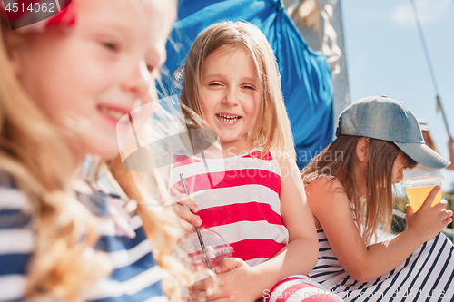 Image of The children on board of sea yacht