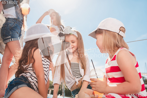 Image of The children on board of sea yacht