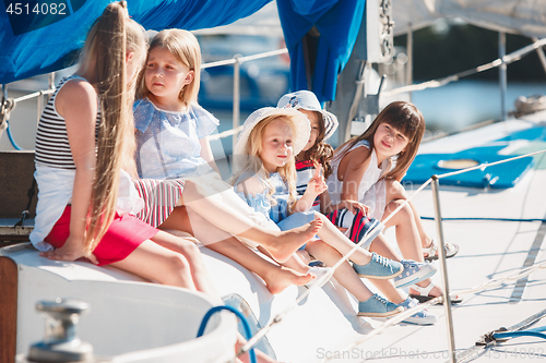 Image of The children on board of sea yacht