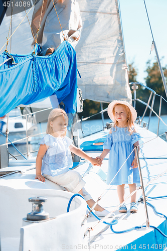 Image of The children on board of sea yacht