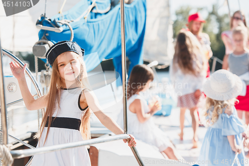 Image of The children on board of sea yacht