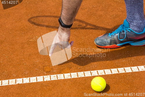 Image of Tennis player shows the track on the tennis court