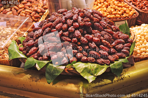 Image of Bunch of dried dates for sale in market