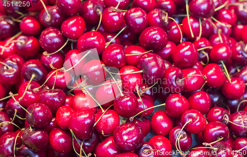 Image of Pile of ripe red fresh cherries as background