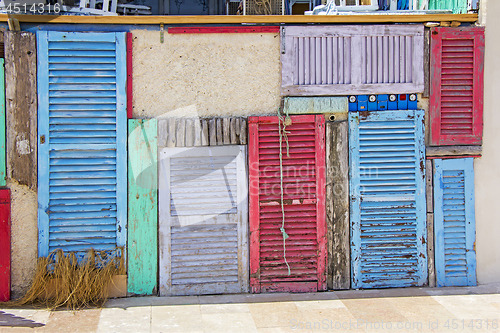 Image of Colorful old wooden doors in Formentera near Ibiza