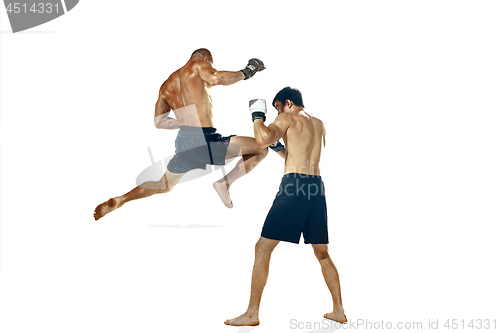 Image of Two professional boxer boxing isolated on white studio background