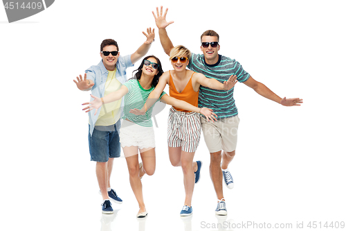 Image of friends in sunglasses having fun