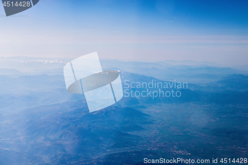 Image of Mountain view from an airplane window.